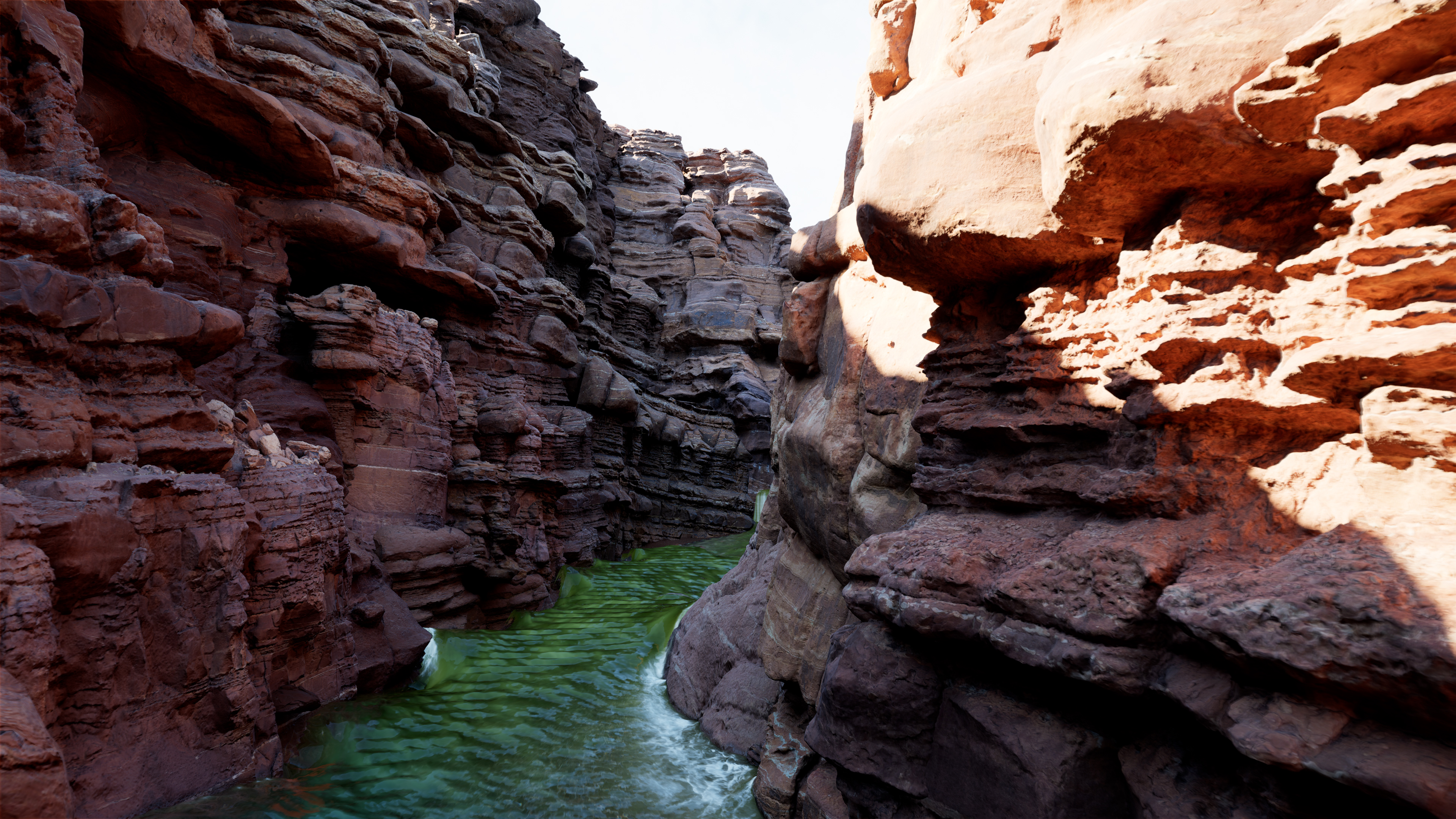 A canyon with a river.